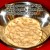 Carefully punch down the risen dough with your finger tips. Carefully punch down the risen dough with your finger tips.