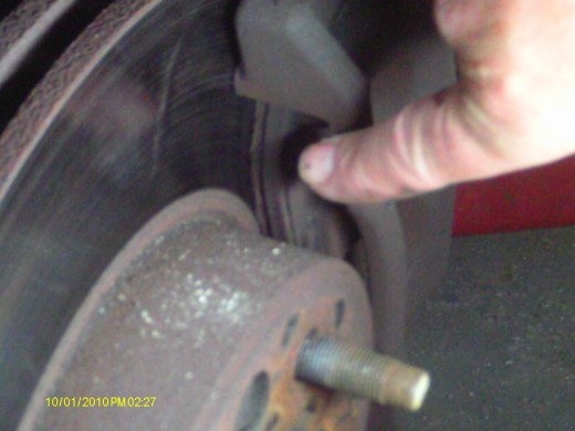 Inspect the brakes before removing the calipers