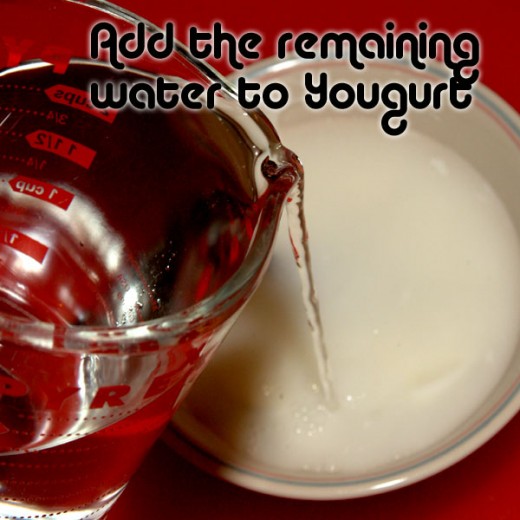Add the remaining water to the lightly thinned yogurt.