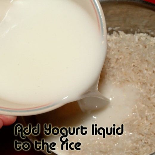 Pour the liquid yogurt over the rice.