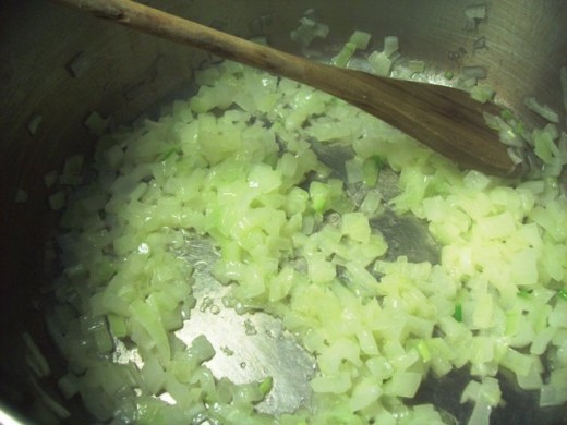 Saute the onions in oil until they look translucent.  About 3 minutes.