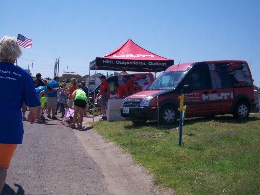 Many businesses set up tents along the rout to give out water and refreshments.
