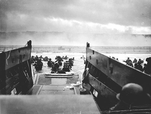 A LCVP (Landing Craft, Vehicle, Personnel) from the U.S. Coast Guard-manned USS Samuel Chase disembarks troops of the U.S. Army's First Division on the morning of June 6, 1944 (D-Day) at Omaha Beach.