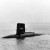 USS Scorpion (SSN-589) 22 August 1960, off New London, Connecticut. A "GUPPY" type submarine is faintly visible in the distance, just beyond the forward tip of Scorpion's "sail".