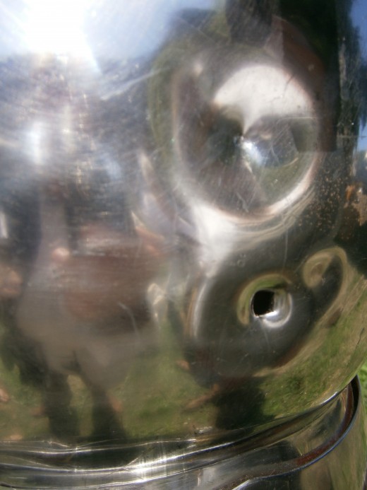Bottom hole: Warbow. Top dent: Crossbow