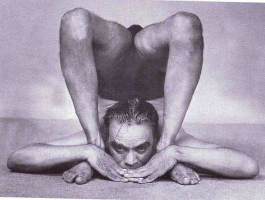 B.K.S. Iyengar performing the final stage of Ganda Bherandasana. This picture is from the article Can Yoga Prevent Dementia? See below.