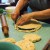 Putting the top crust on. Putting the top crust on.