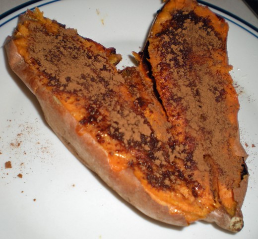 Baked sweet potato topped with brown sugar and cinnamon mixture, ready to eat
