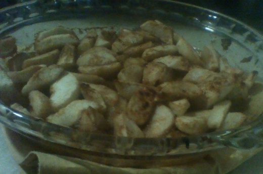 Close-up of a baking dish full of soft, warm, sweet and spicy apples