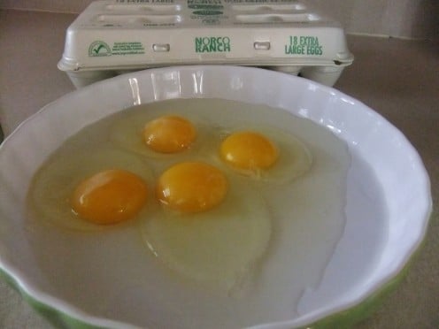 Crack eggs into a wide, flat bottom dish.  You can use only the whites but whole eggs make a richer batter.  