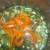 Add desired veggies to cooked rice. At this point the water used to cook rice should be mostly gone. Onion, garlic, orange bell pepper, cavanders, and sea salt.