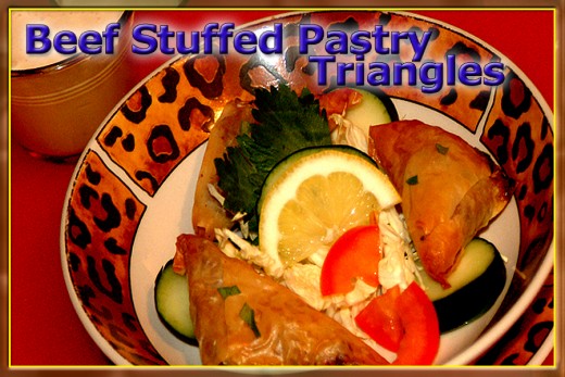 A wonderful finger food, these stuffed triangles are great with a yogurt, honey, and lemon dipping sauce! (Find the sauce recipe below)