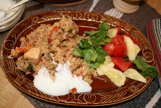 Finished Yummy Biryani with yogurt, cucumbers and fresh tomatoes