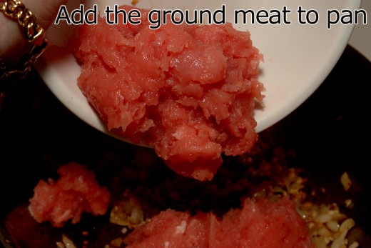 Add the freshly ground meat to saucepan and cook over medium heat.