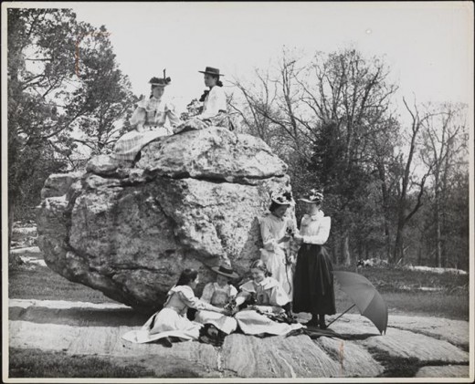 Title: Bronx Park, on Rocking Stone Date: 1895 Comments:  seven young women on Rocking Stone in Bronx Park. 