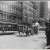 Title: [Fire engine on lower Broadway] Date: 1900 Comments: View of a horse-drawn fire truck on lower Boadway. A crowd watches from both sides of the street. 