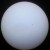 The sun pre-transit: 2:42 PM. Testing the rig. That's a lot of sunspots! The sun's activity waxes and wanes in an 11-year cycle, and "solar max" (maximum flares/sunspots" is in 2013. 