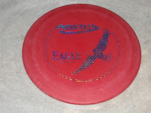 A Driver disc like this, along with a putter are sufficient for most beginners.
