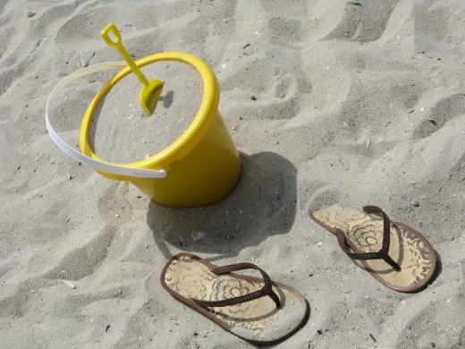 Wearing flip flops on the beach keeps feet cool from the hot sand.