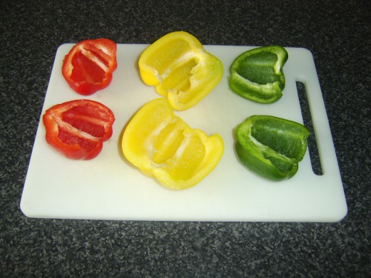 Bell peppers are halved and seeded