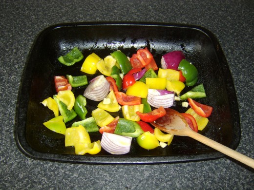 Vegetables are seasoned, oiled and stirred