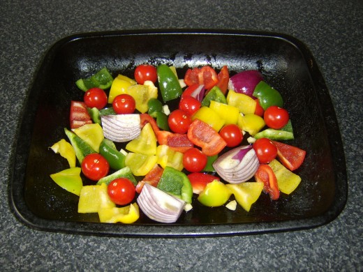 Tomatoes are laid on vegetables
