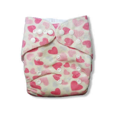 Alva cloth diaper, with heart print.