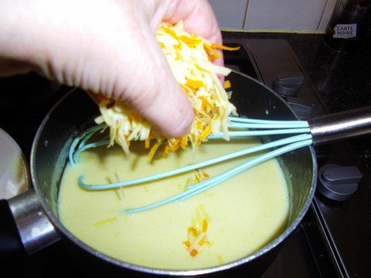 Stir in the cheese when the sauce has thickened.