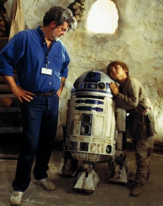George Lucas with R2D2 and Jake Lloyd.