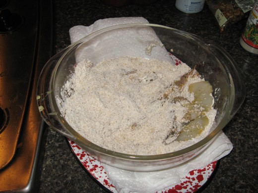 Dip shrimp in egg wash and roll in breading mixture.