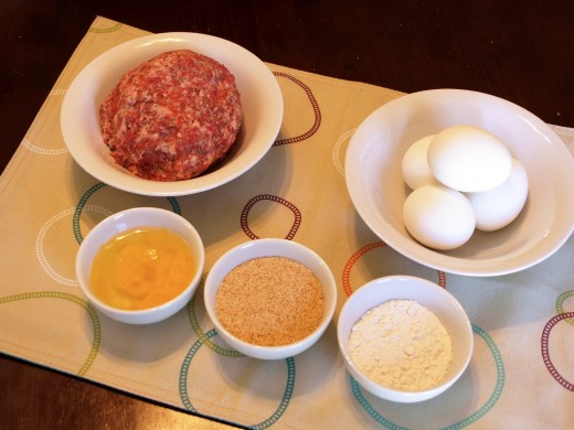 Ingredients -- Sausage Meat, Raw Egg, Hard Boiled Eggs, Breadcrumbs