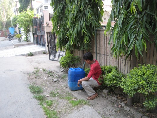 Filling water from across the road 