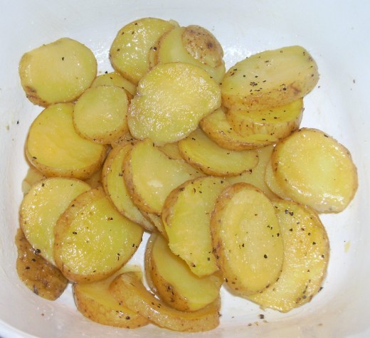 Simple microwaved potatoes can be served with beans and another vegetable for a tasty meatless meal.
