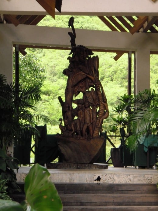 Sculpture by Choiseul artist Lawrence Deligny at the Port Cochere, l'Anse Chastanet, where the minibus leaves for Soufriere and  the Qualibou Drive-in Volcano tour.