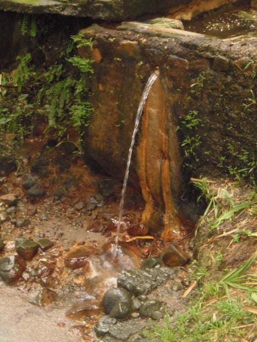 Mineral-rich waters rust the old pipes.