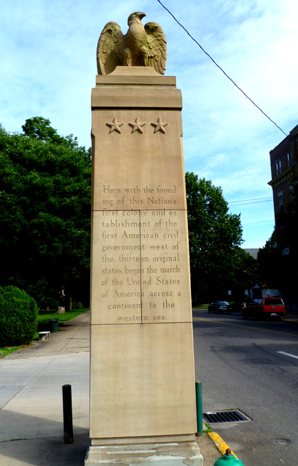 A monument to westward American expansion at the foot of Putnam Bridge