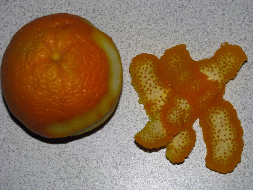 Orange peel can be grated or peeled to be used in the future when making delicious cakes or other items requiring a Tablespoon or so of fresh orange peel.  
