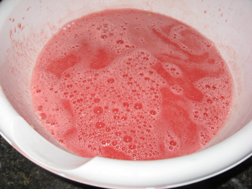 Pour liquid into large bowl.