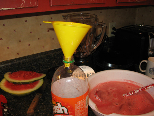 Pour punch mixture into bottles or jars, using a funnel. Refrigerate punch.