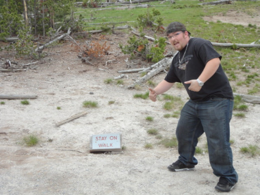 Our friend Corey visiting from Utah demonstrating what not to do in Yellowstone.