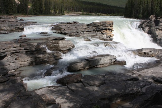 There are many different waterfalls in Jasper National Park, from gentle falls like this to others that cascade down for several hundred meters