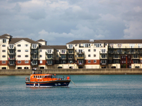 Mersey Class lifeboat 12-36 Royal Thames at its moorings in Soverign Harbour, Eastbourne, Sussex.