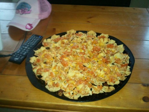 This is nachos made with the chicken as cooked in this recipe.  If you do not need as many quesadillas, you can always freeze half the chicken in an air tight container and make nachos later.  Hope you enjoy!!!!