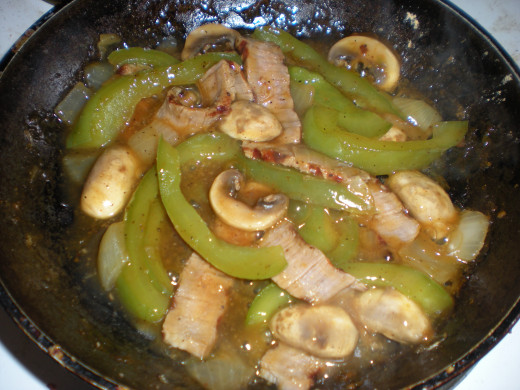 Steak fajitas with mushrooms, green peppers and onions