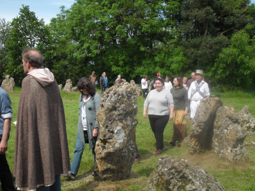 Joining in with Druids to celebrate the summer solstice at the Rollright Stones