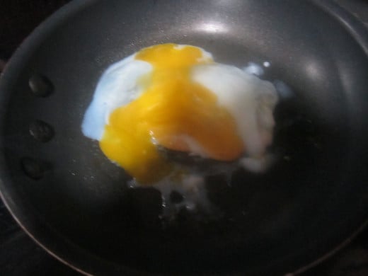 Bust and spread out the egg yolk.