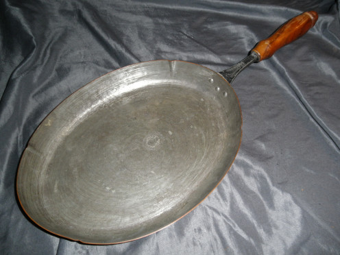 Inside the Stockli Netstal copper pan. The silver tone stuff is tin.