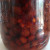 Using a large glass jar, add the cherries and sugar and let it sit for about 7 days in the sun.