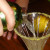 Pour the mixture into the martini glass. Pour the mixture into the martini glass.
