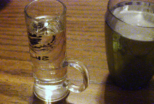 Add the vodka and the quick dissolving sugar to the cocktail shaker.